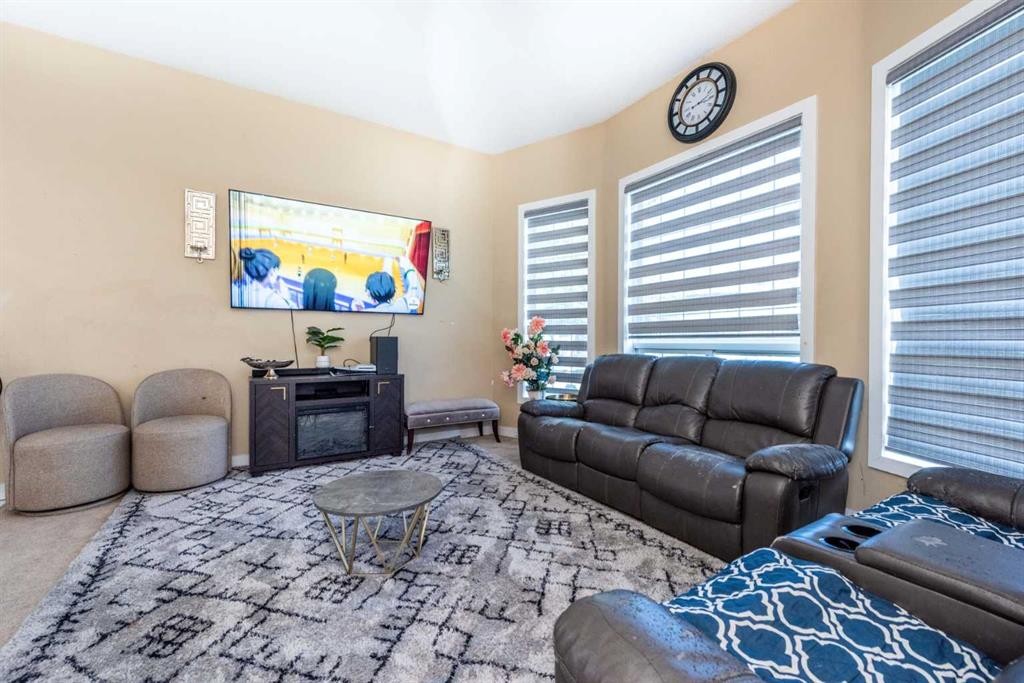 45 Martin Crossing Crescent Ne, Calgary, AB - Indoor Photo Showing Living Room