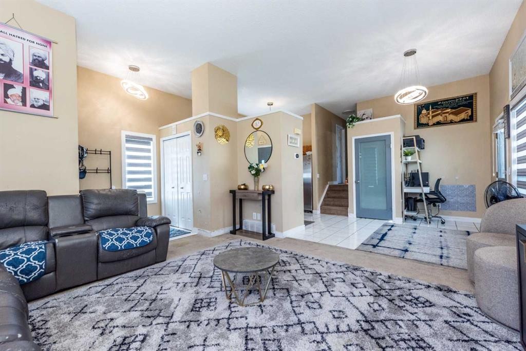 45 Martin Crossing Crescent Ne, Calgary, AB - Indoor Photo Showing Living Room