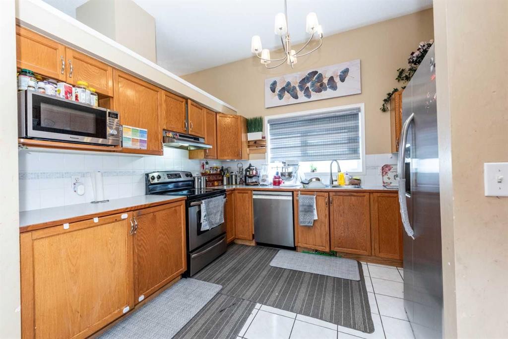 45 Martin Crossing Crescent Ne, Calgary, AB - Indoor Photo Showing Kitchen With Double Sink
