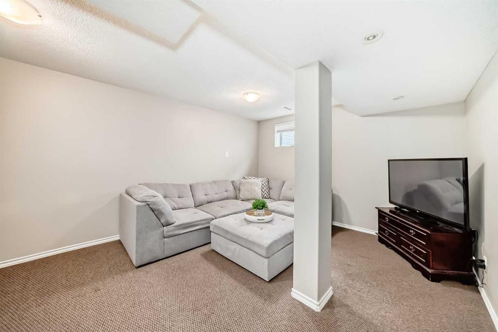 208 Stonegate Crescent Nw, Airdrie, AB - Indoor Photo Showing Other Room