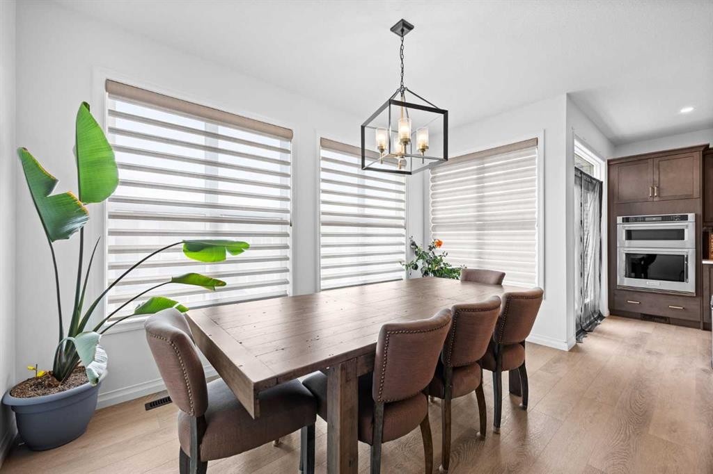224 Precedence Hill, Cochrane, AB - Indoor Photo Showing Dining Room