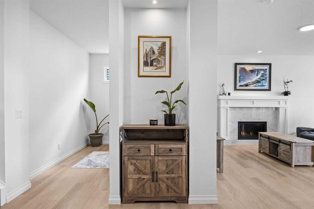 224 Precedence Hill, Cochrane, AB - Indoor With Fireplace