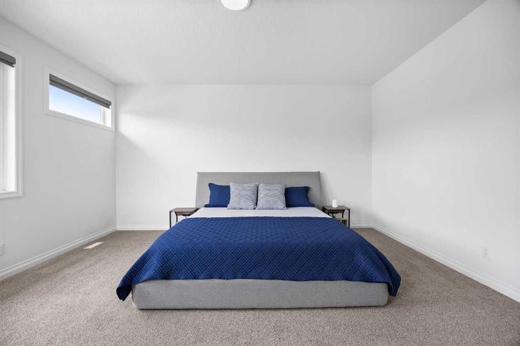 224 Precedence Hill, Cochrane, AB - Indoor Photo Showing Bedroom