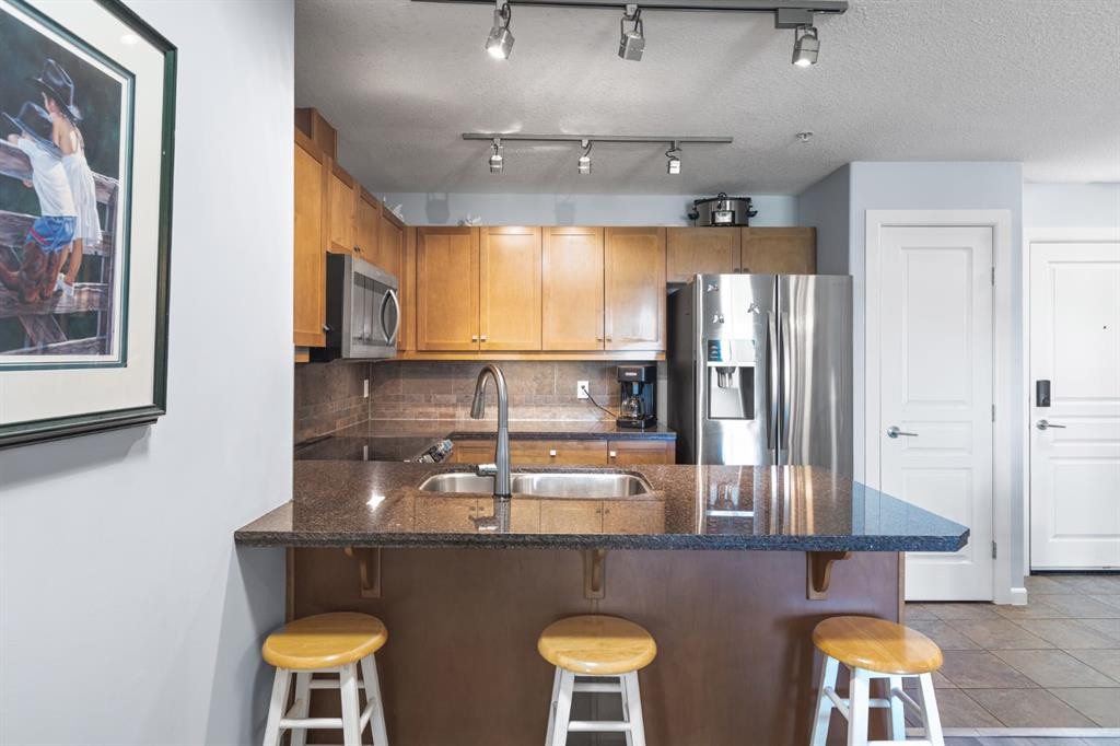206-30 Cranfield Link Se, Calgary, AB - Indoor Photo Showing Kitchen With Double Sink