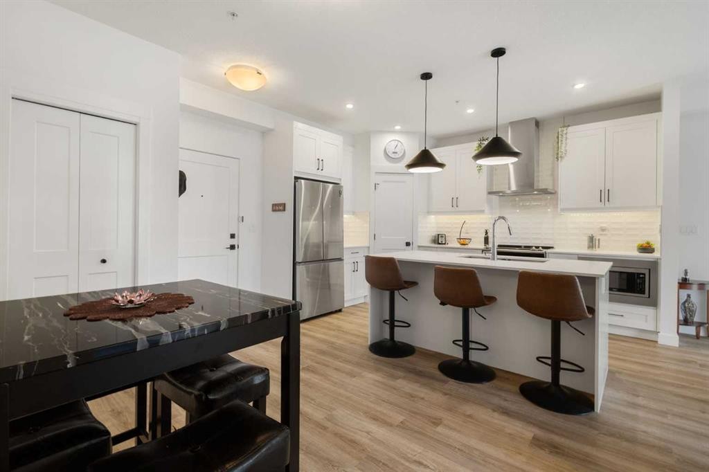 205-10 Sage Hill Walk Nw, Calgary, AB - Indoor Photo Showing Kitchen With Upgraded Kitchen