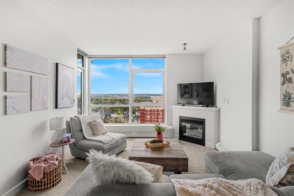 1808-55 Spruce Place Sw, Calgary, AB - Indoor Photo Showing Living Room With Fireplace