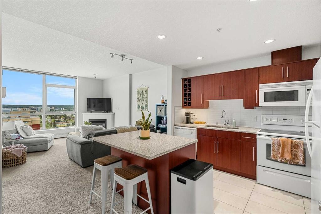 1808-55 Spruce Place Sw, Calgary, AB - Indoor Photo Showing Other Room With Fireplace