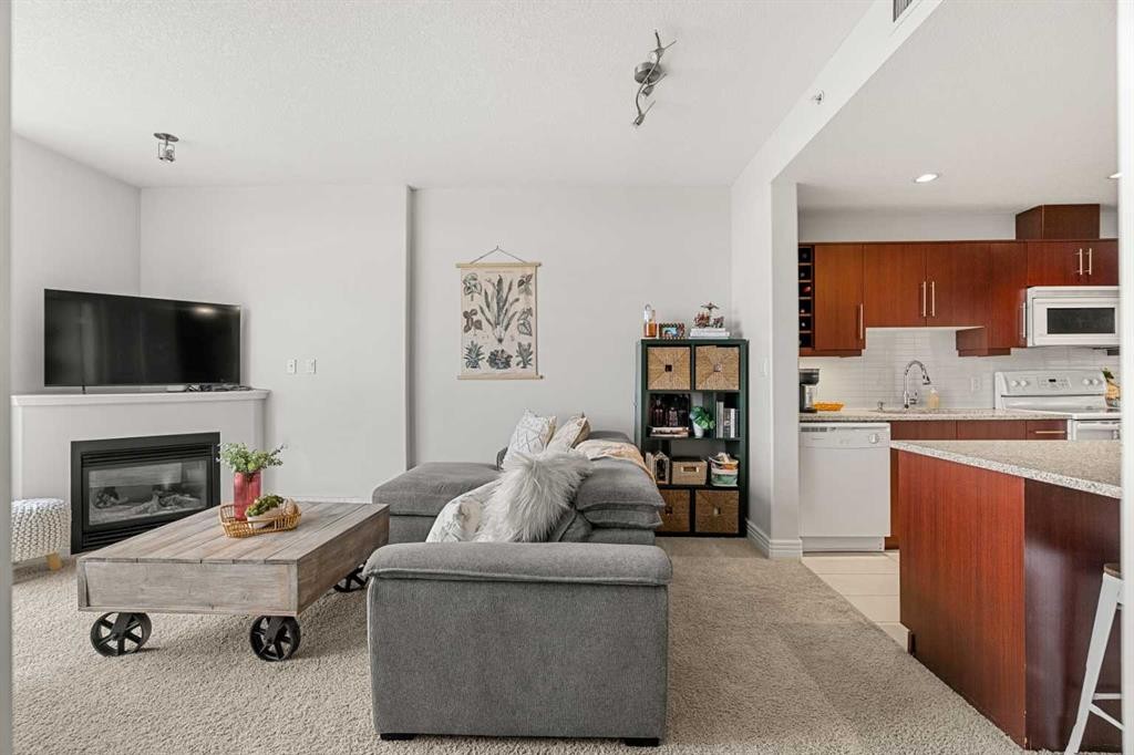 1808-55 Spruce Place Sw, Calgary, AB - Indoor With Fireplace