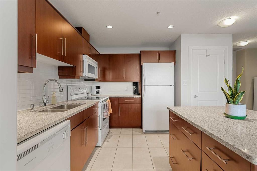 1808-55 Spruce Place Sw, Calgary, AB - Indoor Photo Showing Kitchen With Double Sink