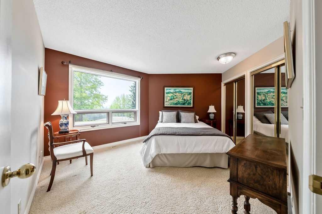 251018 Tower Ridge Estates, Rural Rocky View County, AB - Indoor Photo Showing Bedroom