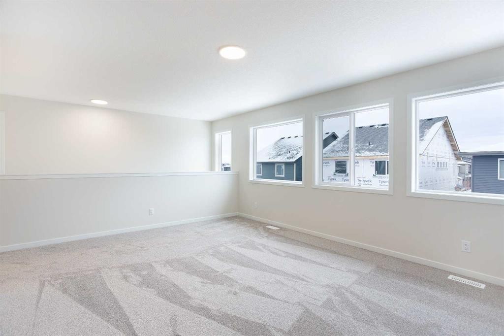 53 Creekside Passage Sw, Calgary, AB - Indoor Photo Showing Other Room
