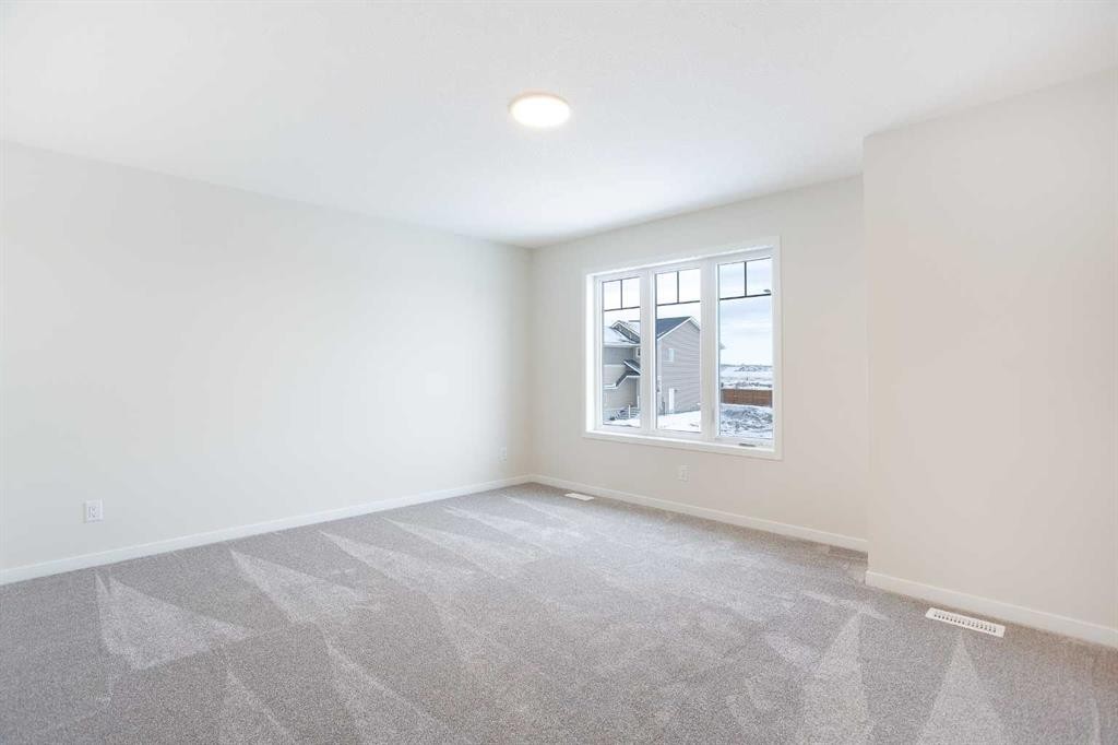 53 Creekside Passage Sw, Calgary, AB - Indoor Photo Showing Other Room