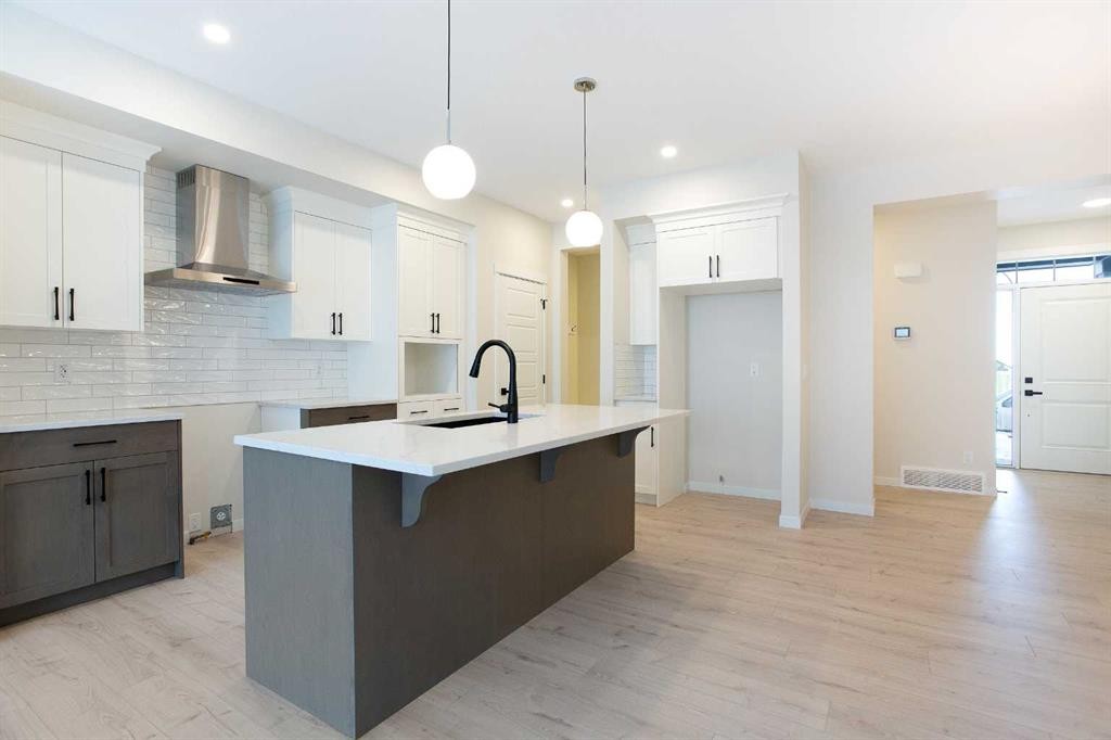 53 Creekside Passage Sw, Calgary, AB - Indoor Photo Showing Kitchen With Upgraded Kitchen