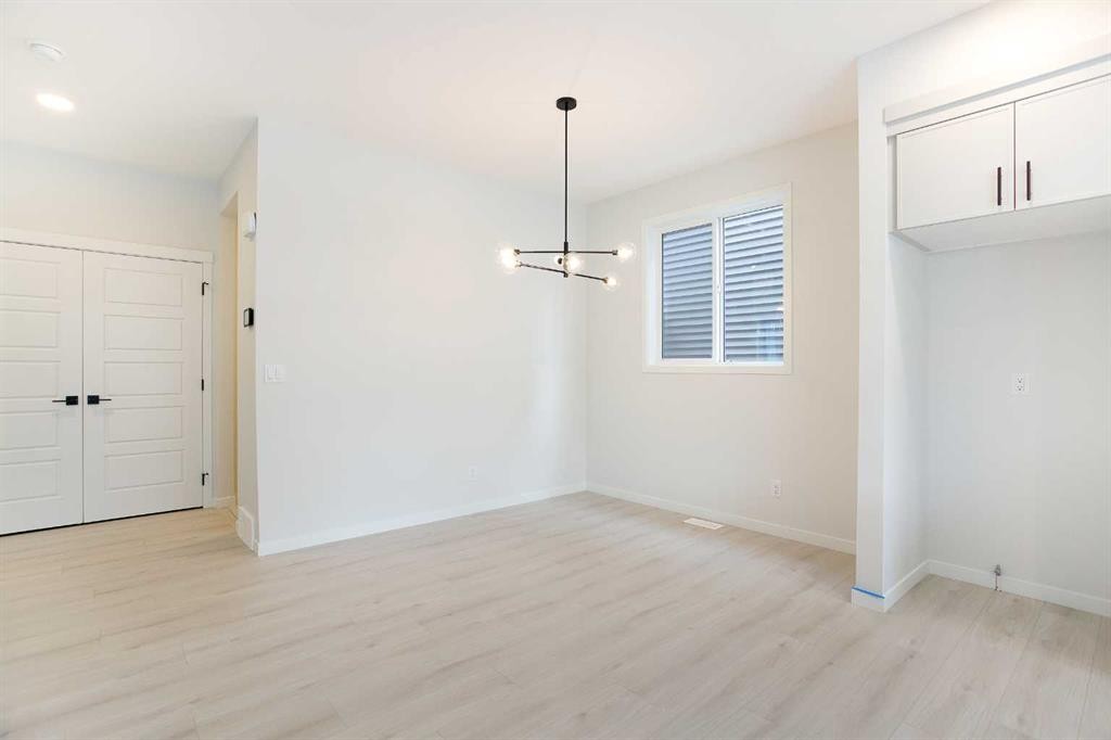 49 Creekside Passage Sw, Calgary, AB - Indoor Photo Showing Other Room