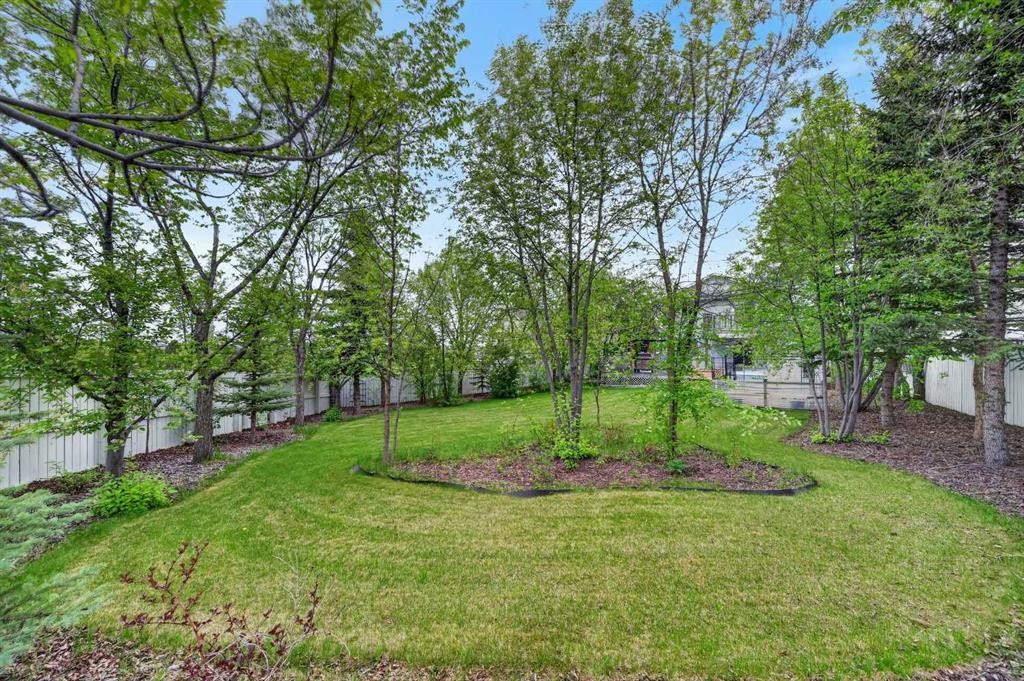 378 Panamount Drive Nw, Calgary, AB - Outdoor With Backyard