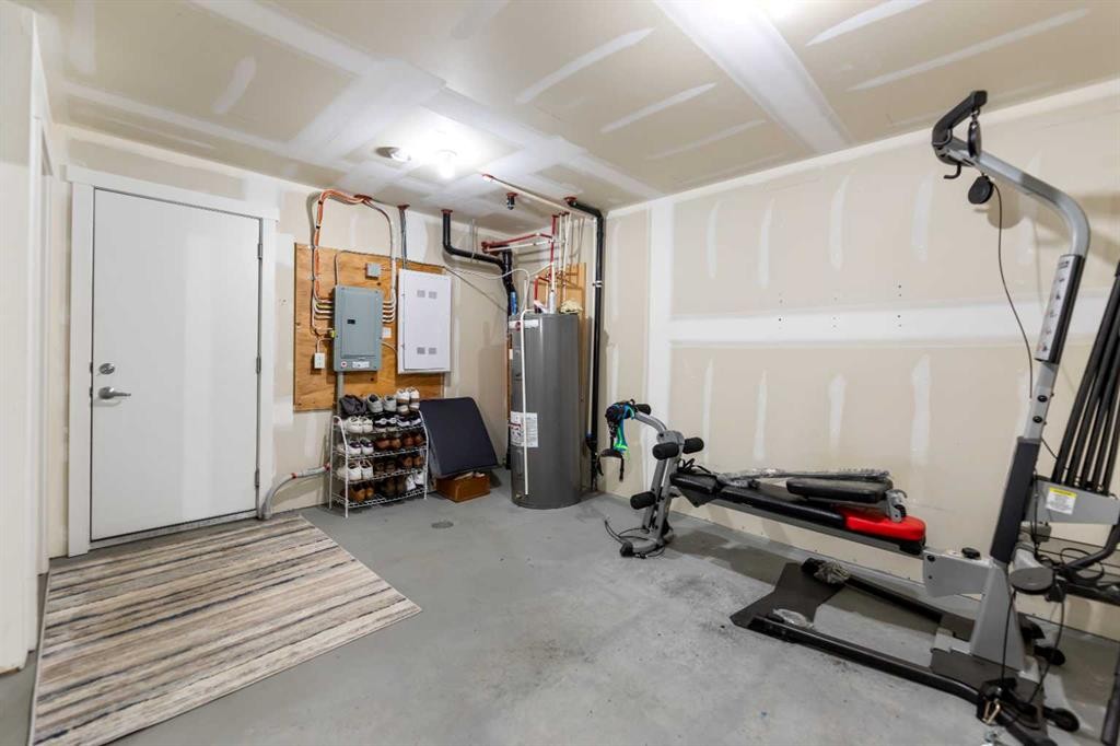 165 Cranbrook Villas Se, Calgary, AB - Indoor Photo Showing Gym Room