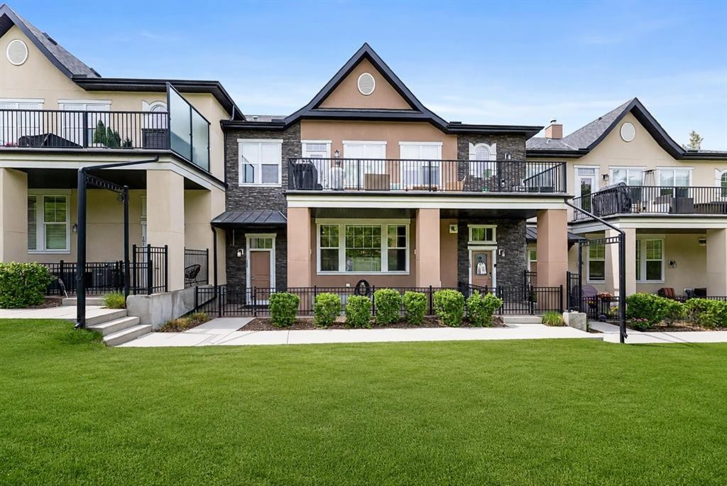 165 Cranbrook Villas Se, Calgary, AB - Outdoor With Deck Patio Veranda With Facade