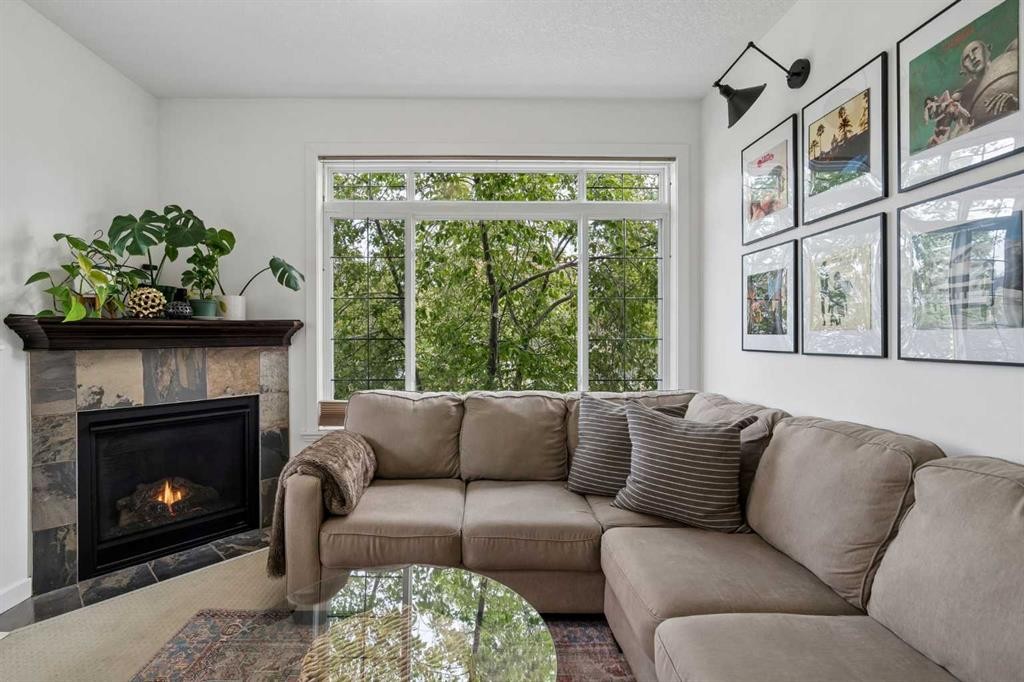 745 Mcdougall Road Ne, Calgary, AB - Indoor Photo Showing Living Room With Fireplace
