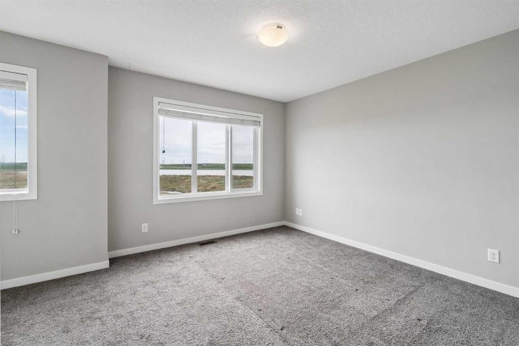 120 Copperstone Villas Se, Calgary, AB - Indoor Photo Showing Other Room