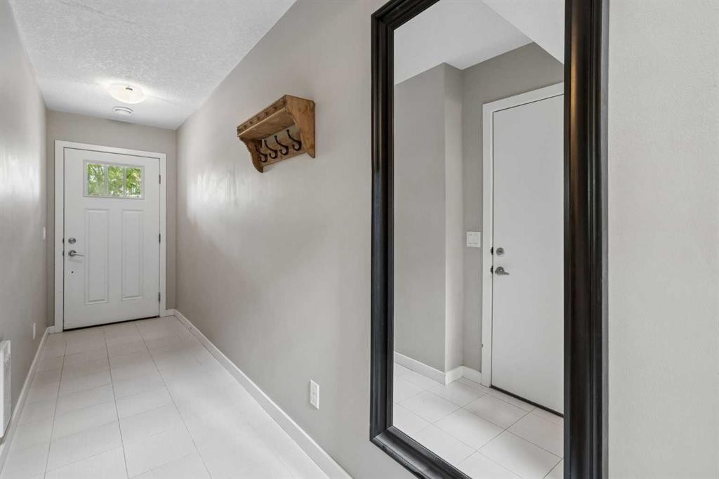 120 Copperstone Villas Se, Calgary, AB - Outdoor With Facade