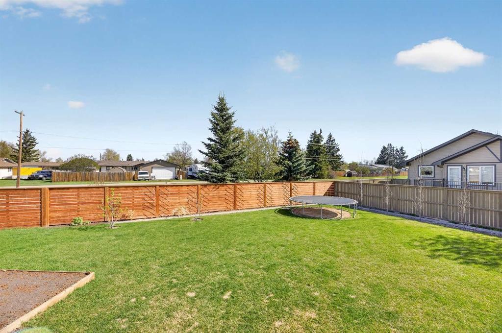 30 Silverstone Place, Didsbury, AB - Outdoor With Backyard