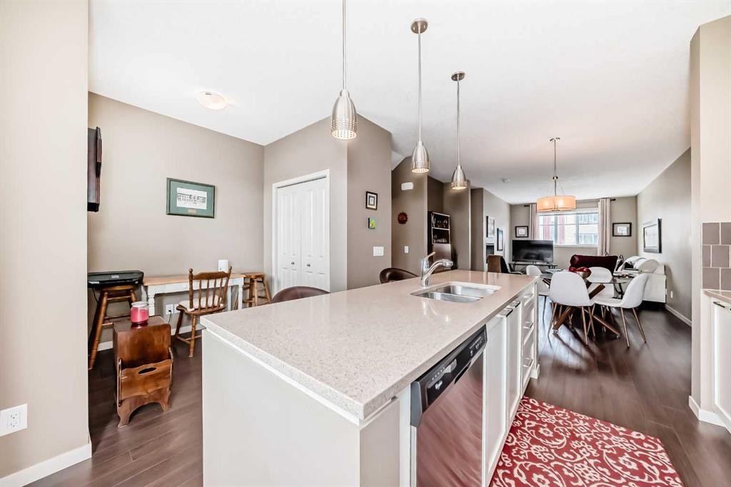 205 Copperpond Row Se, Calgary, AB - Indoor Photo Showing Kitchen With Double Sink