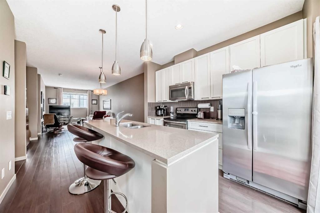 205 Copperpond Row Se, Calgary, AB - Indoor Photo Showing Kitchen With Stainless Steel Kitchen With Double Sink With Upgraded Kitchen