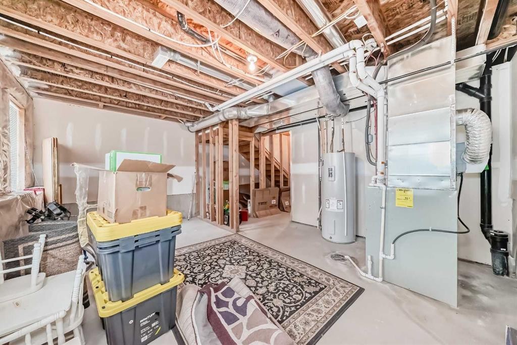 205 Copperpond Row Se, Calgary, AB - Indoor Photo Showing Basement