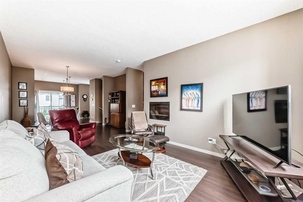 205 Copperpond Row Se, Calgary, AB - Indoor Photo Showing Living Room