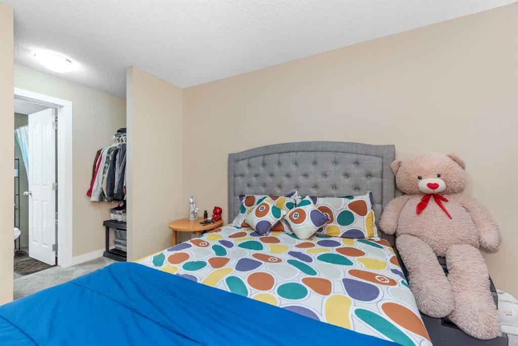 309-7110 80 Avenue Ne, Calgary, AB - Indoor Photo Showing Bedroom