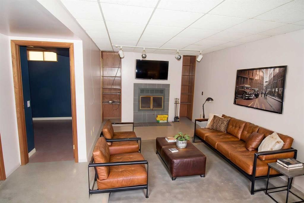340 Templeton Circle Ne, Calgary, AB - Indoor Photo Showing Living Room With Fireplace