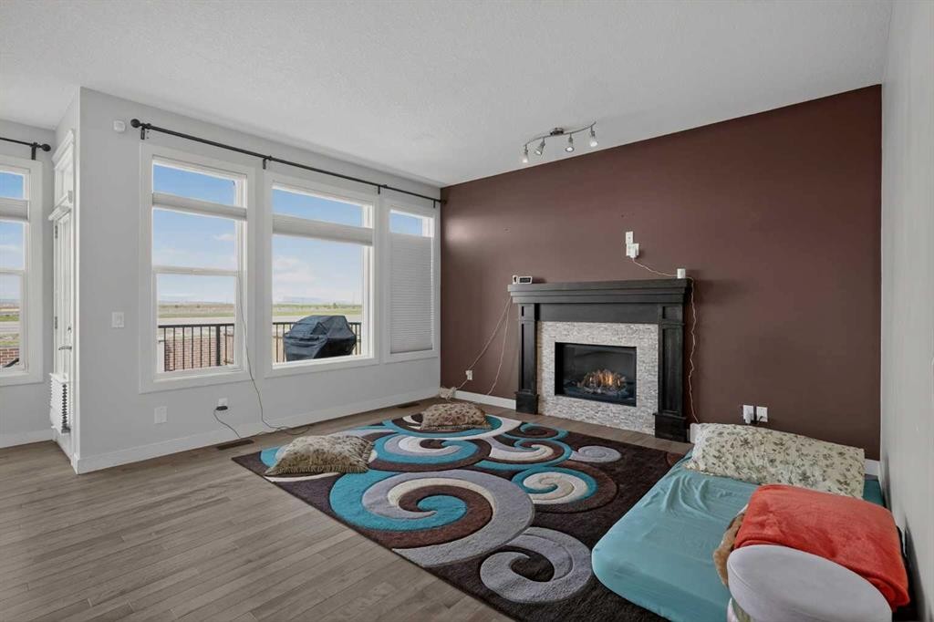 152 Redstone Villas Ne, Calgary, AB - Indoor Photo Showing Living Room With Fireplace