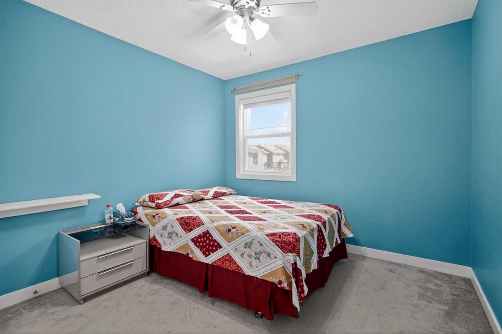 152 Redstone Villas Ne, Calgary, AB - Indoor Photo Showing Bedroom