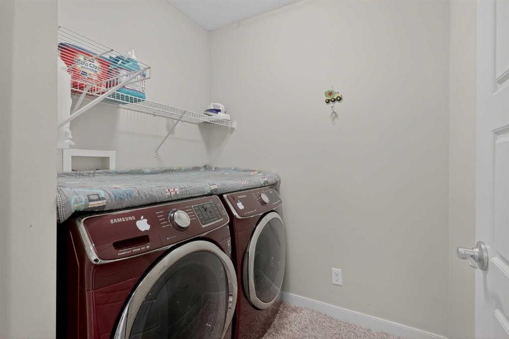152 Redstone Villas Ne, Calgary, AB - Indoor Photo Showing Laundry Room