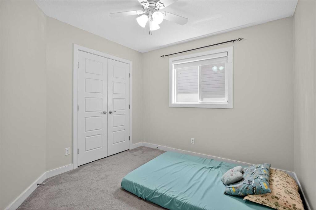 152 Redstone Villas Ne, Calgary, AB - Indoor Photo Showing Bedroom