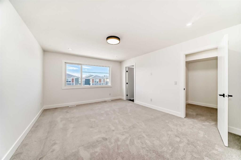 28 Saddlecrest Manor Ne, Calgary, AB - Indoor Photo Showing Other Room