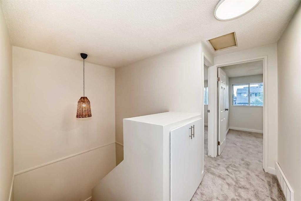 32-1515 Falconridge Drive Ne, Calgary, AB - Indoor Photo Showing Other Room
