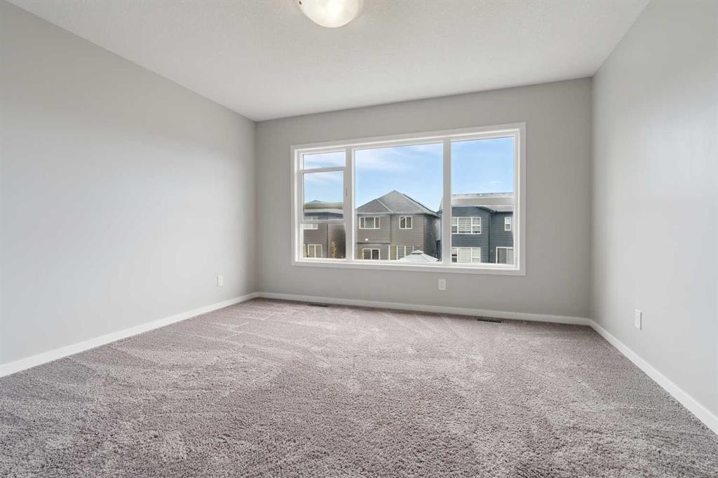 98 Seton Road Se, Calgary, AB - Indoor Photo Showing Other Room