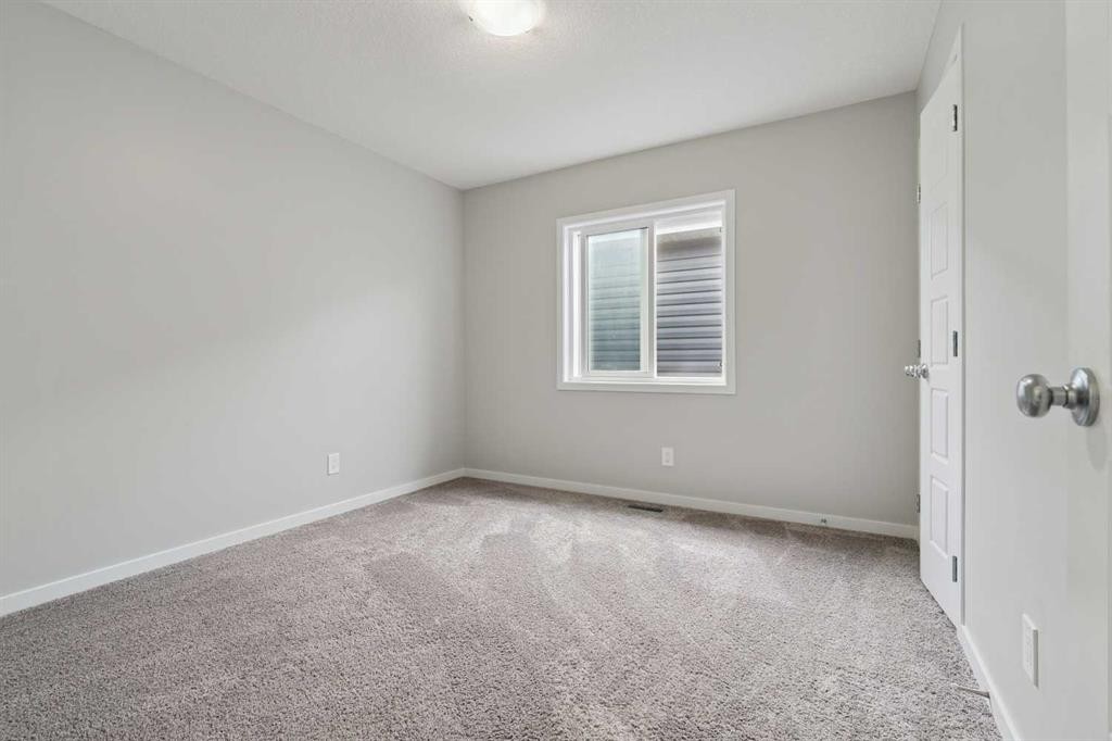 98 Seton Road Se, Calgary, AB - Indoor Photo Showing Other Room