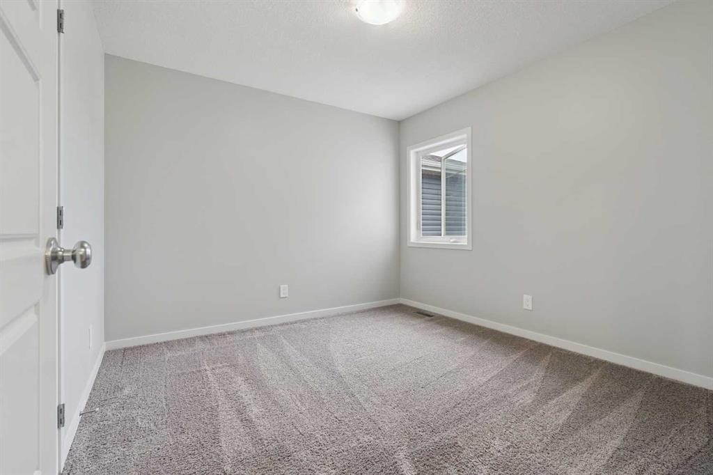 98 Seton Road Se, Calgary, AB - Indoor Photo Showing Other Room