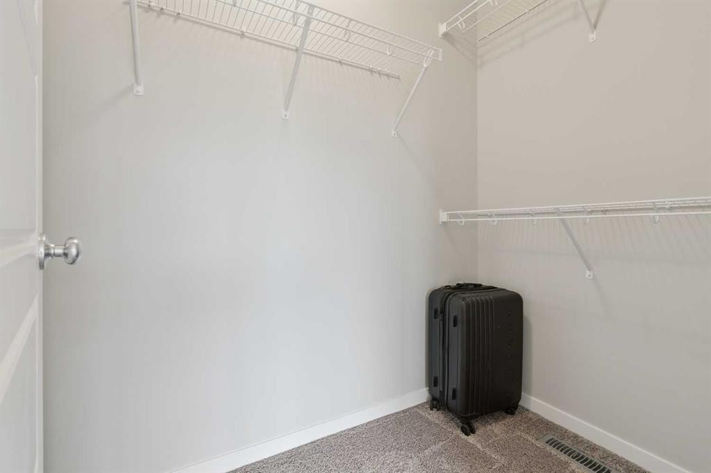 98 Seton Road Se, Calgary, AB - Indoor With Storage