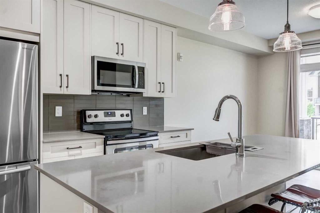 120-20 Walgrove Walk Se, Calgary, AB - Indoor Photo Showing Kitchen With Stainless Steel Kitchen With Upgraded Kitchen