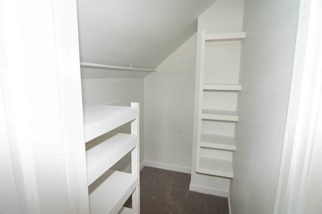 235 Avonburn Road Se, Calgary, AB - Indoor With Storage