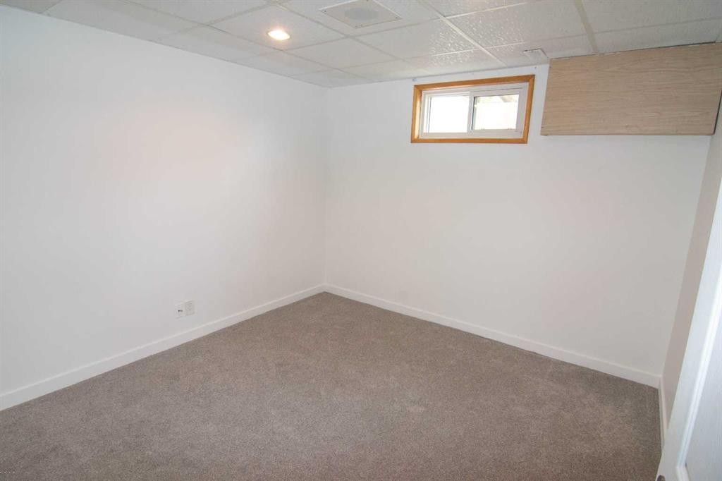 235 Avonburn Road Se, Calgary, AB - Indoor Photo Showing Other Room