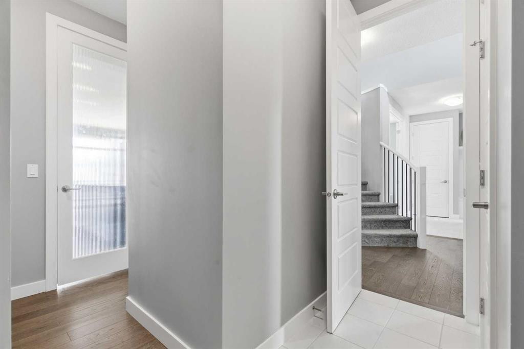 12 Ranchers Bay, Okotoks, AB - Indoor Photo Showing Other Room
