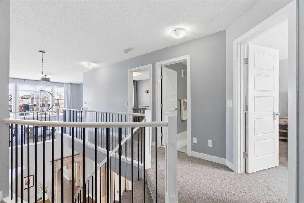12 Ranchers Bay, Okotoks, AB - Indoor Photo Showing Other Room