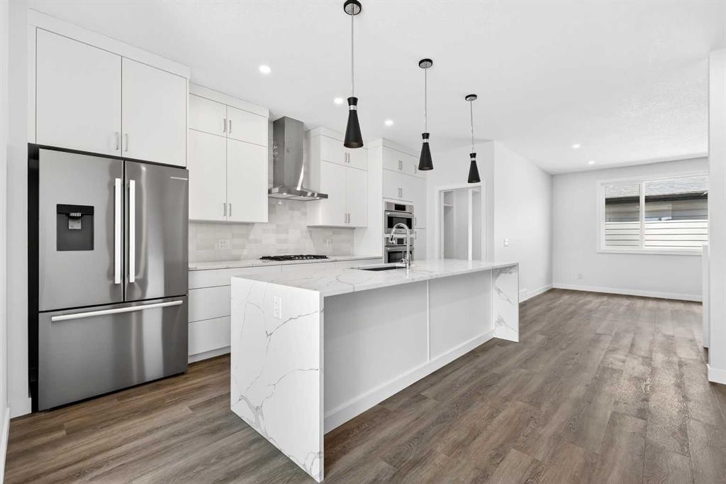 1109 Sailfin Heath, Rural Rocky View County, AB - Indoor Photo Showing Kitchen With Upgraded Kitchen