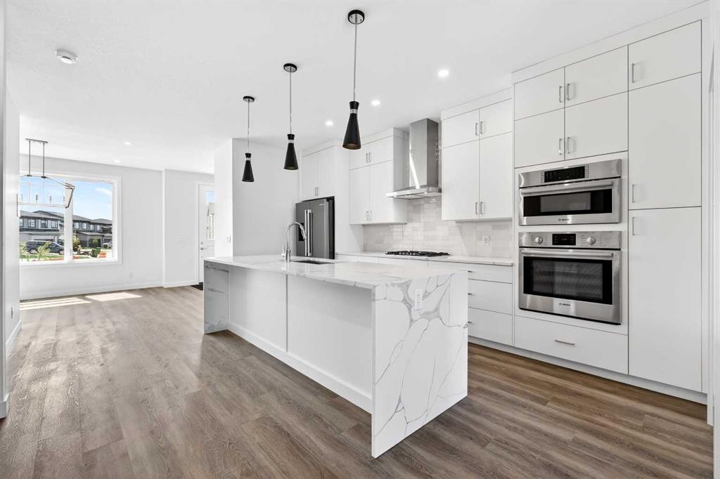 1109 Sailfin Heath, Rural Rocky View County, AB - Indoor Photo Showing Kitchen With Upgraded Kitchen