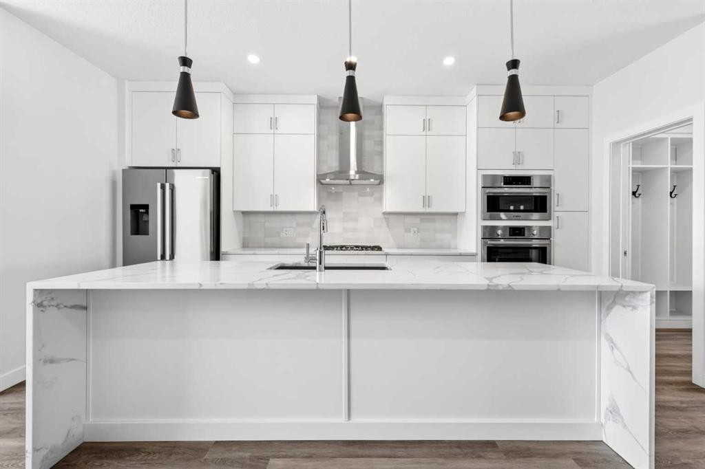 1109 Sailfin Heath, Rural Rocky View County, AB - Indoor Photo Showing Kitchen With Upgraded Kitchen