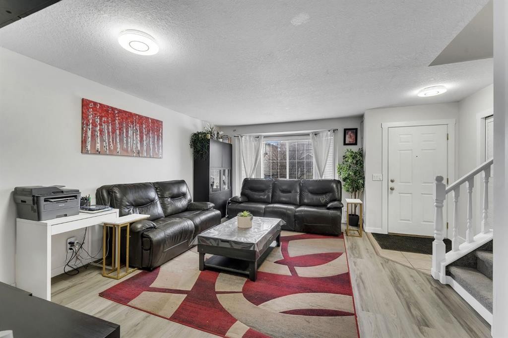 192 Martin Crossing Crescent Ne, Calgary, AB - Indoor Photo Showing Living Room